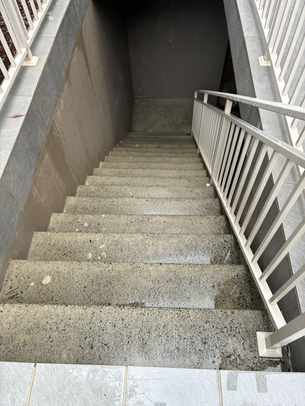 Clean concrete stairwell after pressure washing